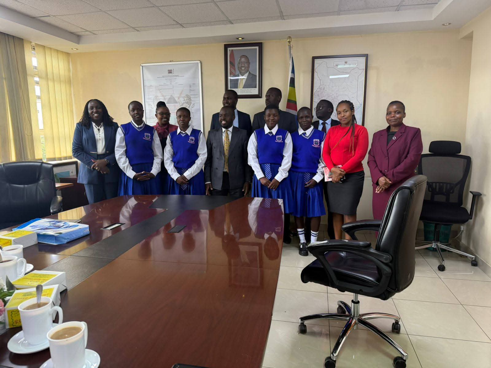 Students receiving academic recognition in the Principal's Office